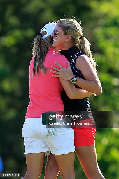 Azahara Munoz of Spain is congratulated by LPGA golfer Belen Mozo of Spain after defeating Candie Kung of Taiwan in the championship match at the...