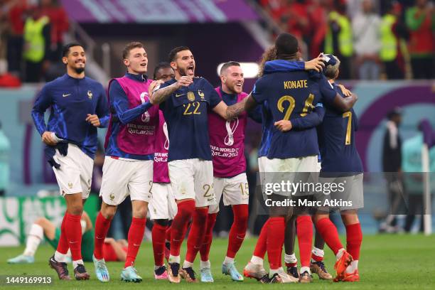 William Saliba, Benjamin Pavard, Theo Hernandez. Jordan Veretout, Ibrahima Konate and Antoine Griezmann of France celebrate following their team's...