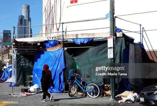 Homeless encampment lines a sidewalk in the Skid Row community on December 14, 2022 in Los Angeles, California. New Los Angeles Mayor Karen Bass...
