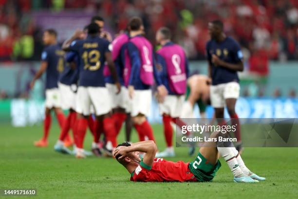 Achraf Dari of Morocco reacts after the 0-2 loss during the FIFA World Cup Qatar 2022 semi final match between France and Morocco at Al Bayt Stadium...