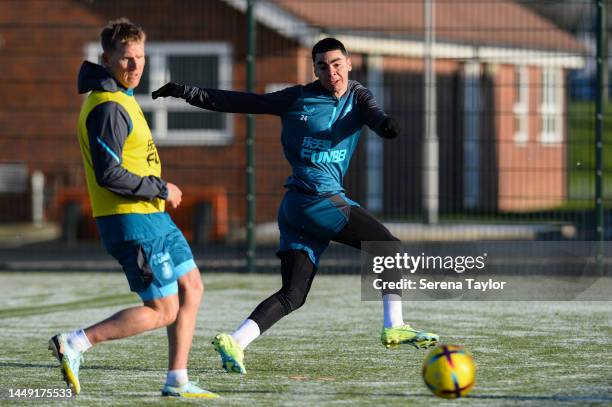 Miguel Almirón strikes the ball during a Newcastle United Training Session at the Newcastle United Training Centre on December 14, 2022 in Newcastle...