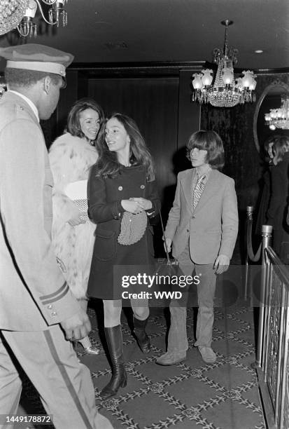 Lee Radziwill , Anna Christina Radziwill , and John F. Kennedy Jr. Attend a preview screening of "The Day of the Dolphin" in New York City on...