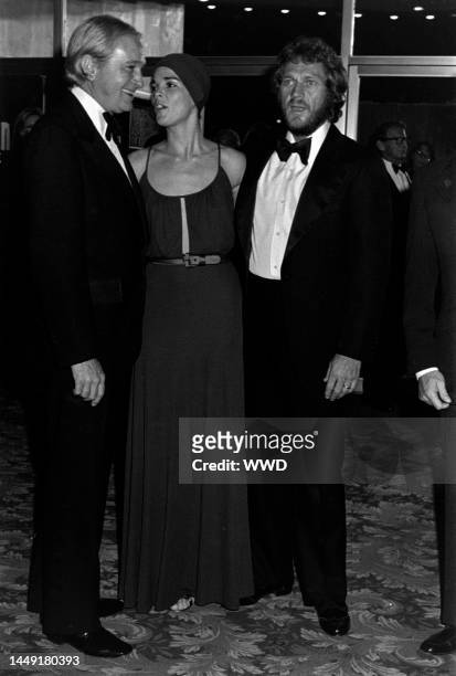 Franklin J. Schaffner, Ali MacGraw, and Steve McQueen attend the premiere of "Papillon" at the Beverly Hills Theater in Beverly Hills, California, on...