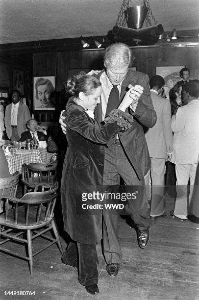 Louise Sorel dances with Ken Howard during a farewell party for outgoing New York City Mayor John Lindsay at Gallagher's in Manhattan on December 26,...