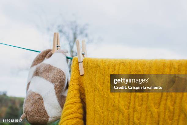 drying clothes outside - clothespin string stock pictures, royalty-free photos & images