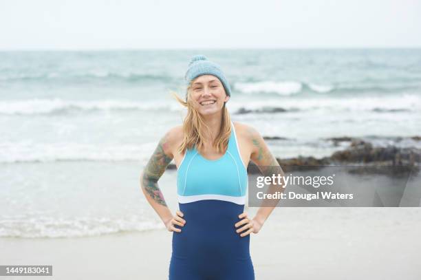 a happy female sea swimmer - ordinary people stock pictures, royalty-free photos & images