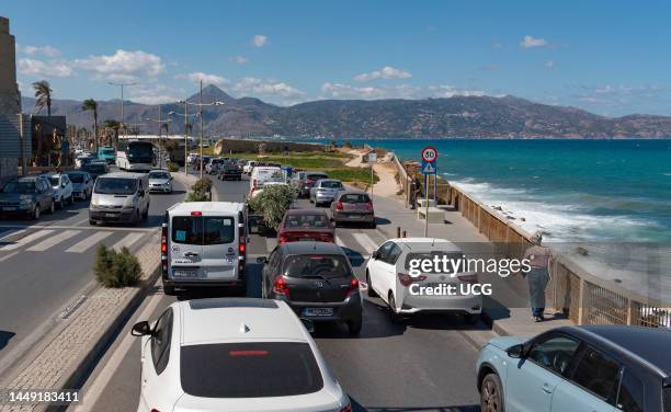 Heraklion, Crete, Greece, Heraklion heavy traffic heading out of the city heading west along coast.