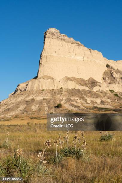 Eagle Rock, composed of approx flat-lying Oligocene White River Group and Oligocene-Miocene Arikaree Group of Scotts Bluff National Monument,...