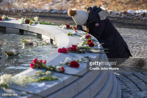 Mourner visits the Sandy Hook Permanent Memorial on the 10th anniversary of the school shooting on December 14, 2022 in Newtown, Connecticut....
