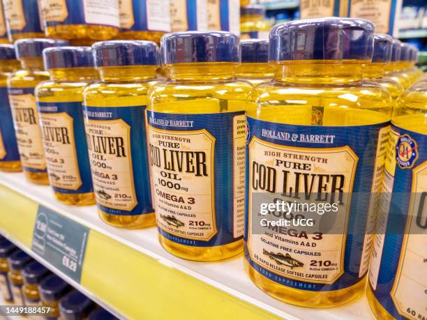 Cod liver oil capsules in Holland & Barrett, UK.