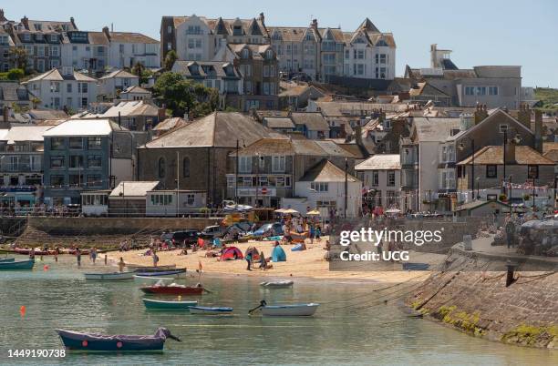 St. Ives, Cornwall, England, UK, Holidaymakers on the town beach in St Ives, Cornwall, UK.