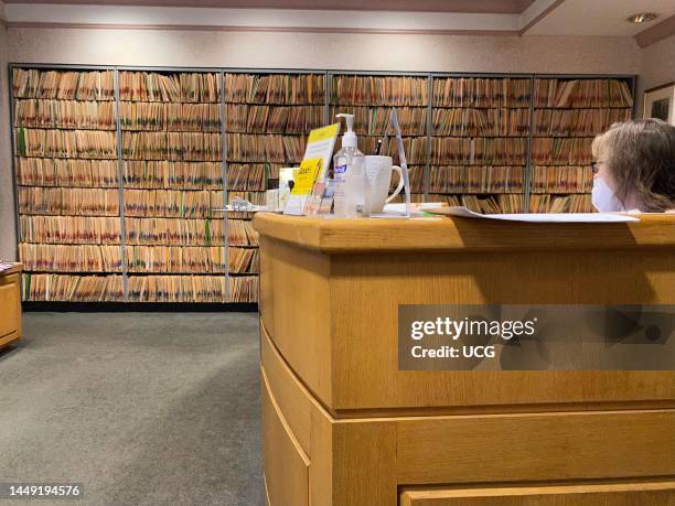 Doctors office reception and medical records filing system, Manhattan, New York.