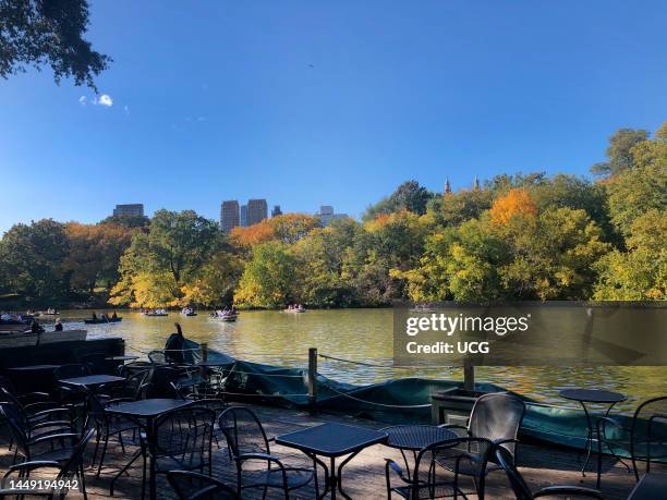 View of boaters on the lake from the now closed The Loeb Boathouse, Central Park, Manhattan, New York City.