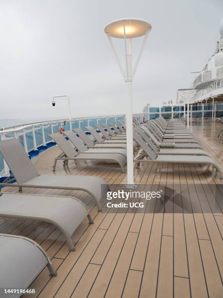 Wet afternoon on the sun deck a cruise ship in the North Sea.