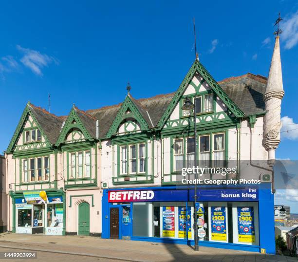 Betfred bookmakers shop in historic building, High Street, Lowestoft, Suffolk, England, UK.