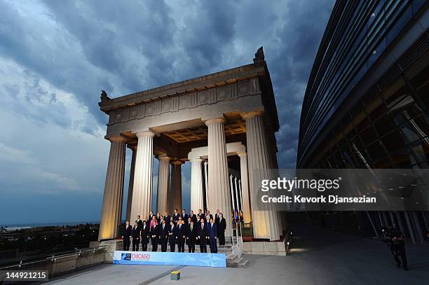 World leaders pose for the family photo at the NATO summit at Soldier Field on May 20, 2012 at in Chicago, Illinois. As sixty heads of state converge...
