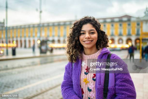 portrait of the teen girl at praça do comércio - girls stock pictures, royalty-free photos & images