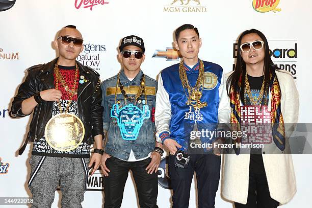 Musicians Prohgress, DJ Virman, Kev Nish and J-Splif of Far East Movement pose in the press room at the 2012 Billboard Music Awards held at the MGM...