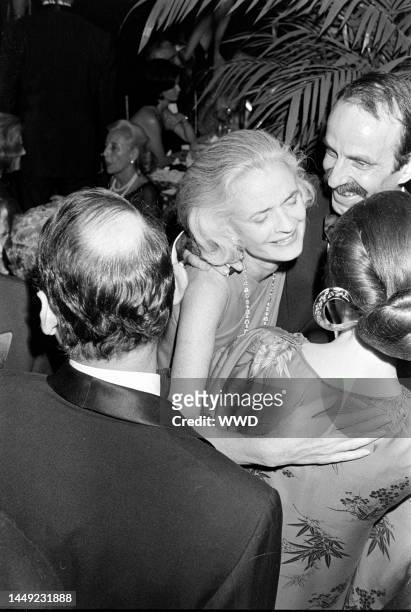 Nancy "Slim" Keith aka Lady Keith , Fred Eberstadt , and Isabel Eberstadt attend a charity party at the Carlyle Restaurant in New York City on...