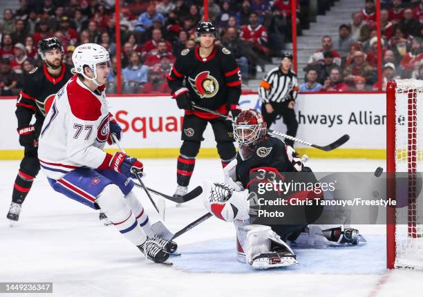 Kirby Dach of the Montreal Canadiens scores against Cam Talbot of the Ottawa Senators during the third period at Canadian Tire Centre on December 14,...