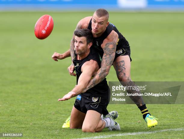 Trent Cotchin and Dustin Martin are pictured contesting for a mark during a Richmond Tigers AFL training session at Punt Road Oval on December 15,...