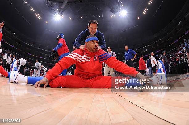 Kenyon Martin of the Los Angeles Clippers stretches before playing against the San Antonio Spurs in Game Four of the Western Conference Semifinals...