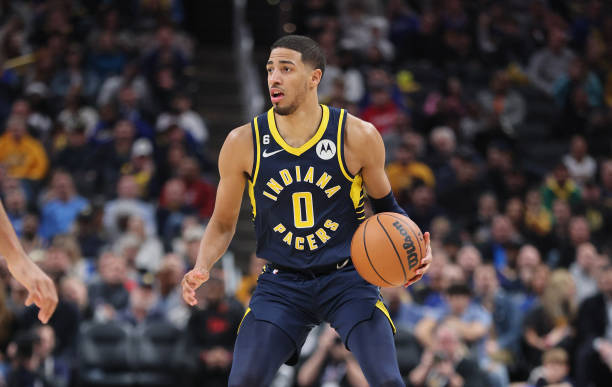 Tyrese Haliburton of the Indiana Pacers dribbles the ball against the Golden State Warriors at Gainbridge Fieldhouse on December 14, 2022 in...