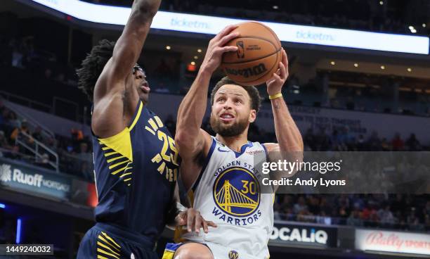 Stephen Curry of the Golden State Warriors against the Indiana Pacers at Gainbridge Fieldhouse on December 14, 2022 in Indianapolis, Indiana. NOTE TO...