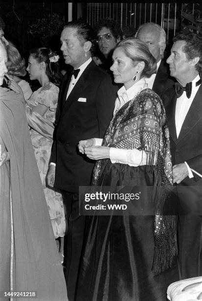 Alexis von Rosenberg - Baron de Rede , Denise Hale , and Count Vega del Ren attend an event in Beverly Hills, California, on November 21, 1976.
