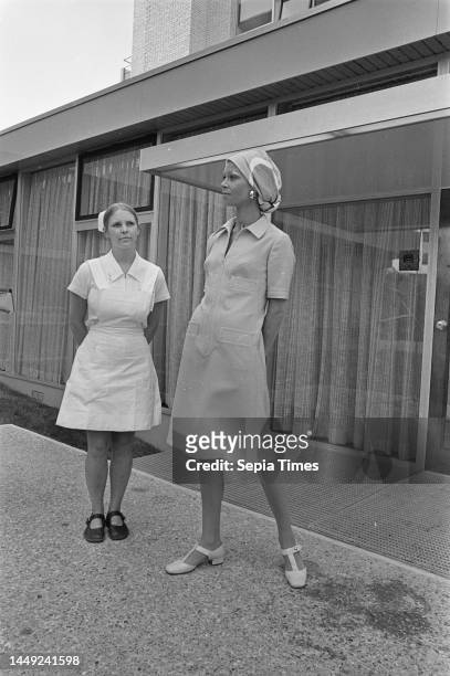 New design nurses uniform by couturier Dick Holthuis commissioned by Red Cross Hospital , Beverwijk; left old uniform, right new uniform /, June 25...
