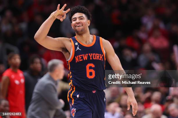 Quentin Grimes of the New York Knicks celebrates a three pointer in overtime against the Chicago Bulls at United Center on December 14, 2022 in...