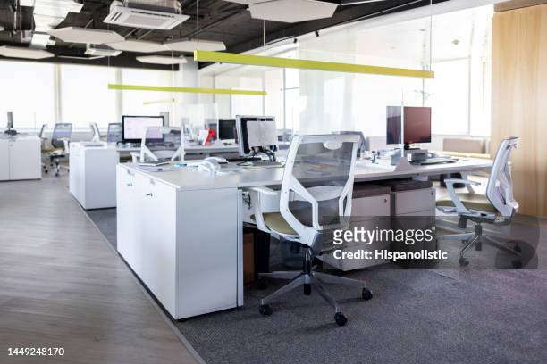 modern office space with several cubicles - empty desk stock pictures, royalty-free photos & images