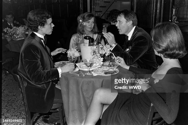 Gordon Pattee and Dailey Pattee attend a party at "21" in New York City on December 11, 1975.