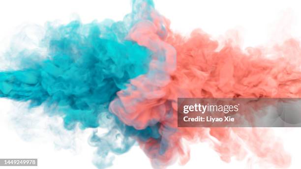 mix of cyan and coral ink in water - spring flowing water stockfoto's en -beelden