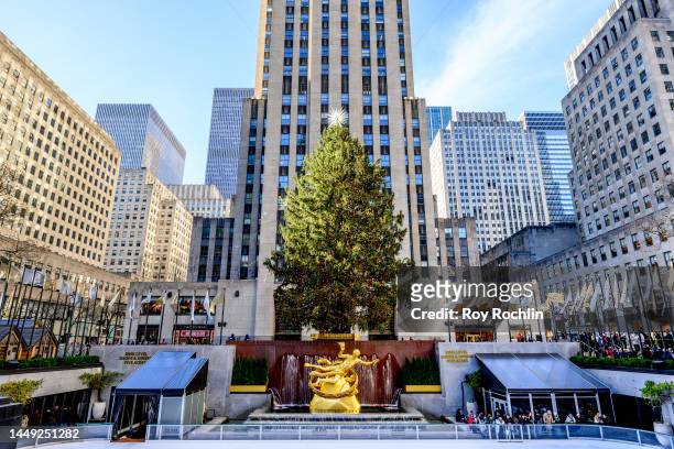 View of the Rockefeller Plaza ice skating rink with the the statue of Prometheus in the center and annual Christmas tree on December 14, 2022 in New...