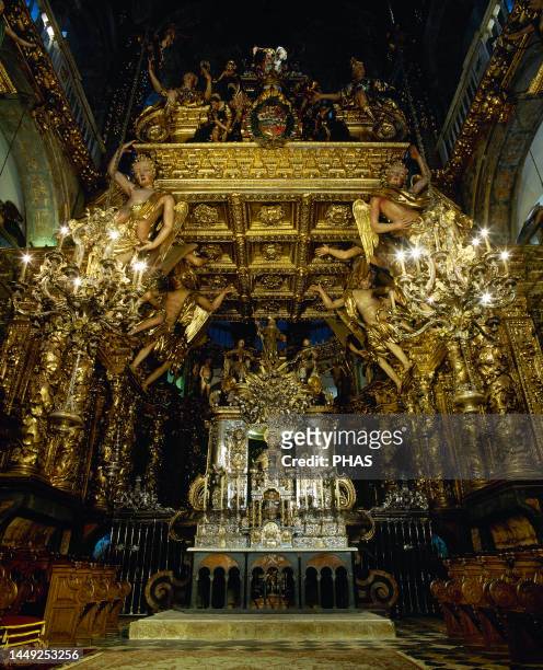 Spain. Cathedral of Santiago. Main Chapel. Altar with the image of the Apostle St. James , sculpted in stone. The baldachin that covers the altar is...