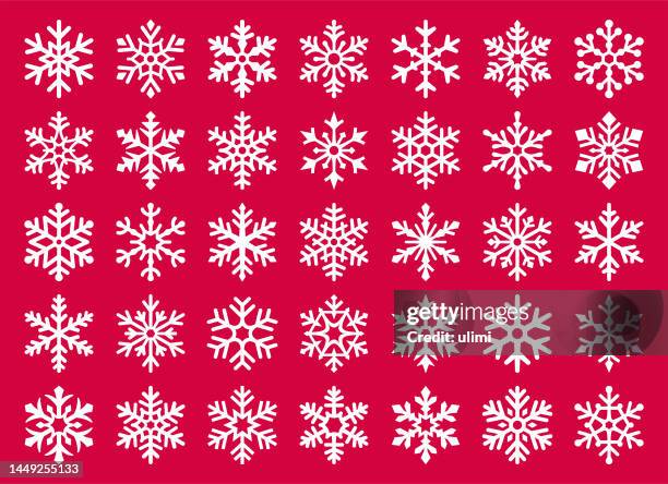 schneeflocken - schneeflocke schneekristall stock-grafiken, -clipart, -cartoons und -symbole