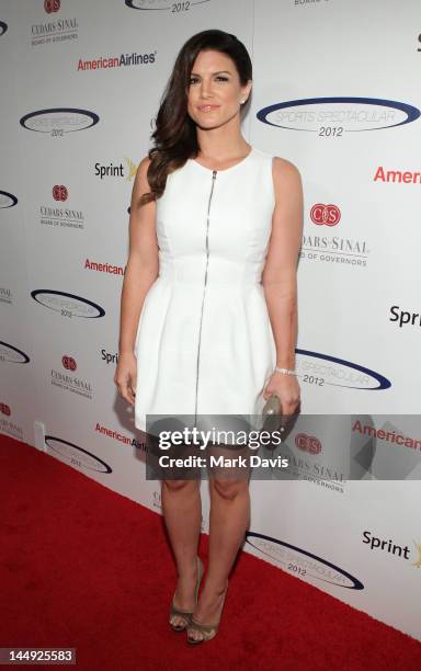 Fighter Gina Carano arrives at the 27th Anniversary Sports Spectacular benefiting Cedars-Sinai Medical Genetics Institute at the Hyatt Regency...