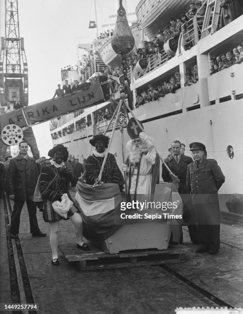 Saint Nicholas and Black Pete visit the emigrant ship the Groote Beer, December 4, 1954.