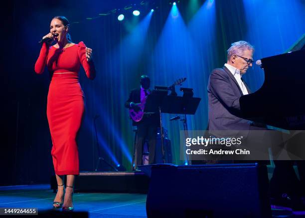 Katharine McPhee and David Foster perform on stage during PNE Winter Fair at Pacific Coliseum on December 14, 2022 in Vancouver, British Columbia,...