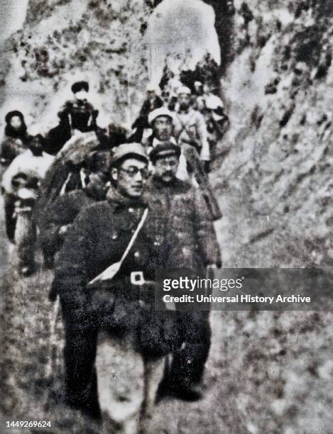The Long March was a military retreat undertaken by the Red Army of the Communist Party of China , the forerunner of the People's Liberation Army, to...
