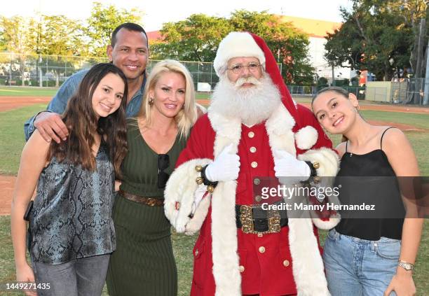 Ella Rodriguez, Alex Rodriguez, Jac Cordeiro and Natasha Rodriguez attend the Boys & Girls Clubs of Miami-Dade Toy Giveaway and Holiday Party on...