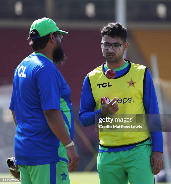 Saqlain Mushtaq, Head Coach of Pakistan talks to Abrar Ahmed of Pakistan during a Net Session ahead of the Third Test match between England and...