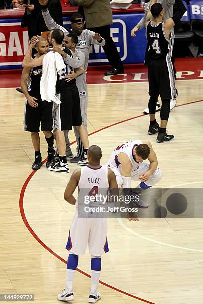 Randy Foye and Blake Griffin of the Los Angeles Clippers reacts after the Clippers lose to the San Antonio Spurs 102-99 in Game Four of the Western...