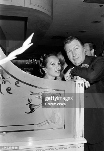 Guests attend a party at Le Poulailler in New York City on May 24, 1976.