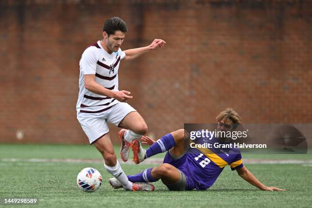 Ryan Yetishefsky of the University of Chicago Maroons avoids a tackle from Jamie Holland of the Williams College Ephs during the Division III Mens...