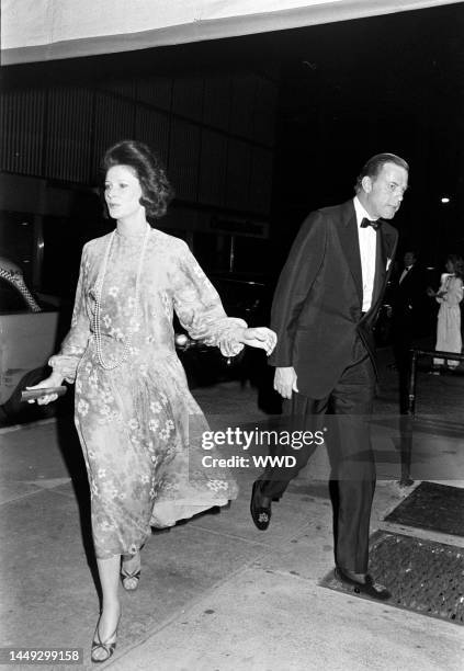 Guests attend a party at Le Poulailler in New York City on May 24, 1976.