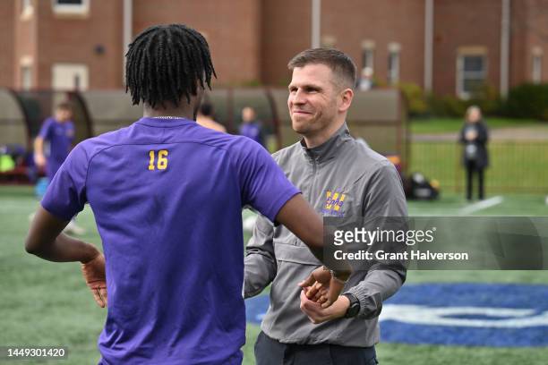 Head coach Steffen Siebert and Keel Brissett of the Williams College Ephs talk before the Division III Mens Soccer Championship game against the...
