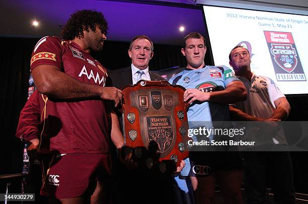 Queensland's Sam Thaiday along with New South Wales captain Paul Gallen and coach Ricky Stuart pose with Victorian Minister for Sport and Recreation...