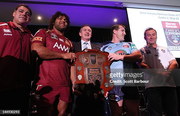 Queensland coach Mal Meninga and Sam Thaiday along with New South Wales captain Paul Gallen and coach Ricky Stuart pose with Victorian Minister for...
